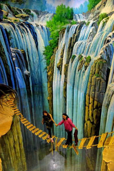 Women on Rickety Bridge at Art in Paradise in Chiang Mai, Thailand - Encircle Photos