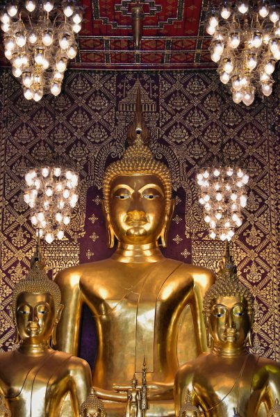 Three Buddha Statues at Wat Phra That Hariphunchai in Lamphun, Thailand - Encircle Photos