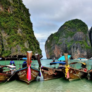 Longtail Boats Beached at Maya Bay on Phi Phi Ley, Thailand - Encircle Photos