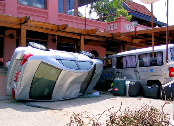 Overturned Car and Van with Luggage After Tsunami on Patong Beach in Phuket, Thailand - Encircle Photos
