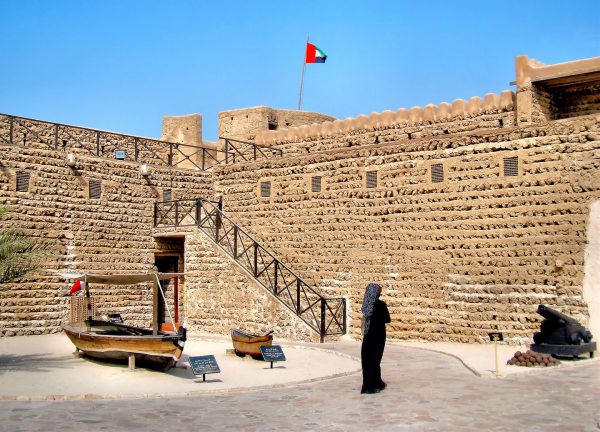 Woman Wearing Abaya with Hijab Scarf inside Al Fahidi Fort in Dubai, UAE - Encircle Photos
