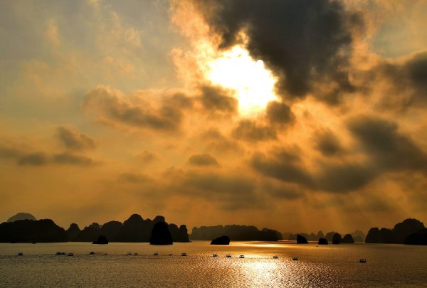 Sunrise over Isles and Fishing Boats in Gulf of Tonkin, Ha Long Bay, Vietnam - Encircle Photos