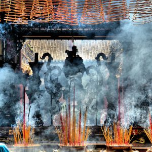 Burning Incense at Altar of Thiên Hâu Temple in Ho Chi Minh City, Vietnam - Encircle Photos