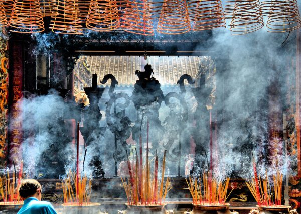 Burning Incense at Altar of Thiên Hâu Temple in Ho Chi Minh City, Vietnam - Encircle Photos