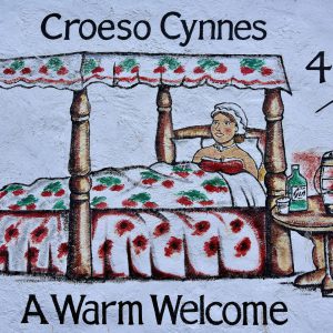 Warm Welcome Mural in Caernarfon, Wales - Encircle Photos