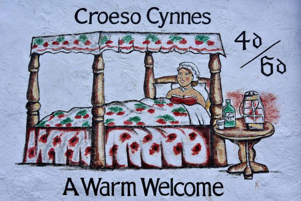 Warm Welcome Mural in Caernarfon, Wales - Encircle Photos